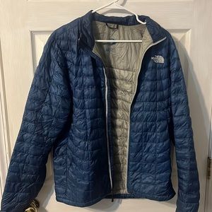 Men’s small North Face navy blue puffer jacket
